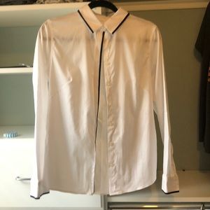 White button up with black trim detail